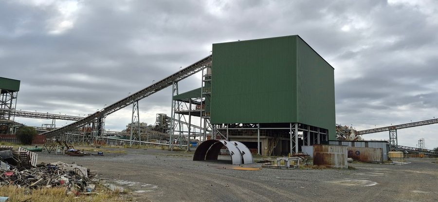 CTP Feed Building — green-clad primary building with conveyor infrastructure